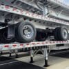 2027 Reitnouer MaxMiser 53×102 Sliding Axle Flatbed close up