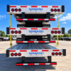 Side view of three stacked Wabash Combo step deck trailers showing raised front decks, lower decks and tandem axles